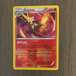 Pokemon Delphox Trading Card - Red and Yellow